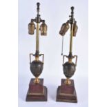 A PAIR OF 19TH CENTURY GRAND TOUR BRONZE AND RED MARBLE COUNTRY HOUSE LAMPS. 50 cm high.