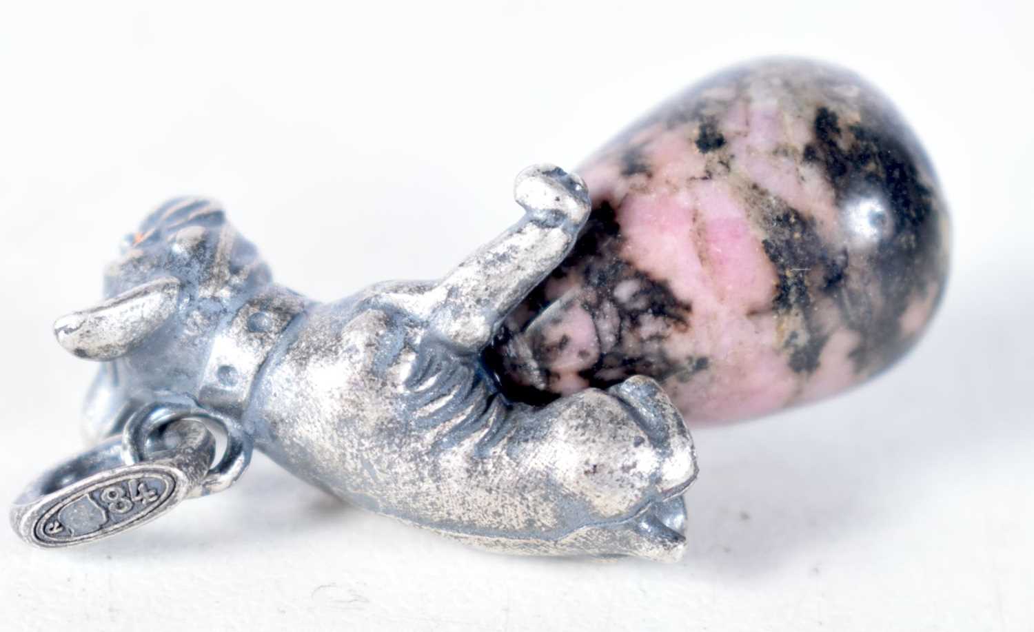 A Continental Quartz Egg Pendant Mounted with a Silver Dog with Gem Set Eyes. Stamped 84, 2.8 cm x 2 - Image 2 of 3