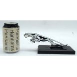 A Chrome Jaguar mascot set on a marble plinth 8 x 20 cm