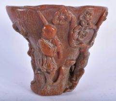 A CHINESE CARVED BUFFALO HORN TYPE LIBATION CUP 20th Century. 669 grams. 13 cm x 13 cm.