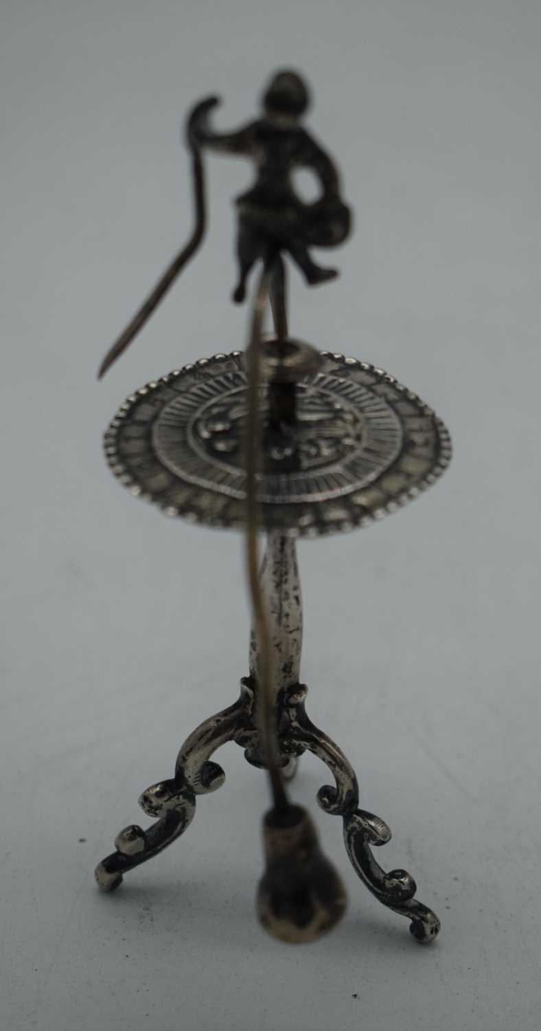 A RARE 18TH CENTURY CONTINENTAL SPINNING MALE TABLE TOY probably Dutch silver. 75 grams. 12 cm x 9.5 - Image 2 of 5