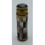 AN ANTIQUE MOTHER OF PEARL SPRINGING SCENT BOTTLE. 53 grams. 10 cm x 2 cm extended.