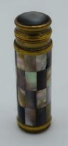 AN ANTIQUE MOTHER OF PEARL SPRINGING SCENT BOTTLE. 53 grams. 10 cm x 2 cm extended.