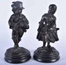 A PAIR OF 19TH CENTURY EUROPEAN BRONZE FIGURES OF A BOY AND GIRL modelled as musicians. 17 cm high.