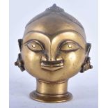 A 19TH CENTURY INDIAN BRONZE FIGURE OF A HINDU DEITY modelled wearing earrings. 15 cm x 10 cm.