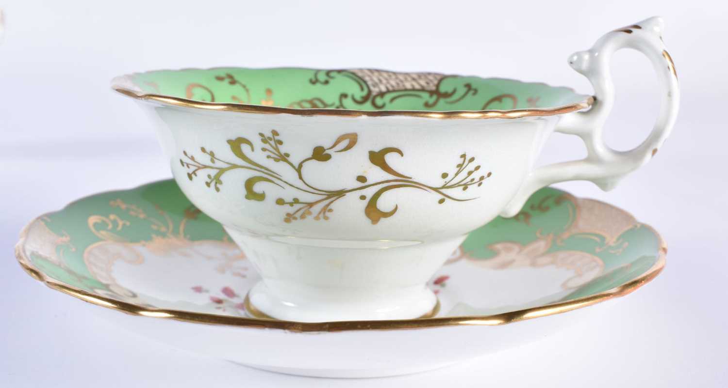 English fine cup and saucer, with coffee cup painted with large specimen flowers under a lime - Image 4 of 8