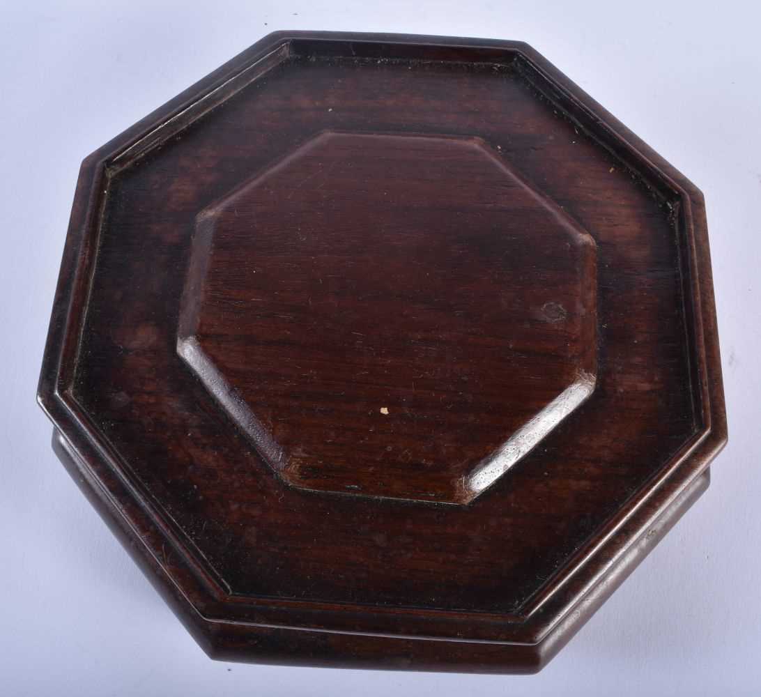 A LARGE 19TH CENTURY CHINESE CARVED WOOD HEXAGONAL STAND Qing, possibly Huanghuali. 19 cm wide. - Image 7 of 8