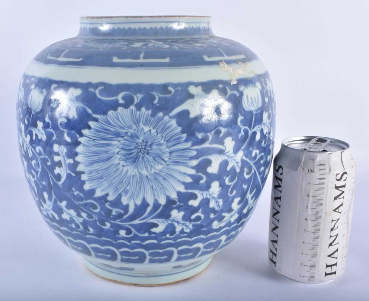 A CHINESE QING DYNASTY BLUE AND WHITE PORCELAIN VASE painted with flowers. 22 cm x 19 cm.