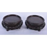 A SMALL PAIR OF 19TH CENTURY CHINESE CARVED HARDWOOD DISPLAY STANDS Qing. 9 cm wide, internal