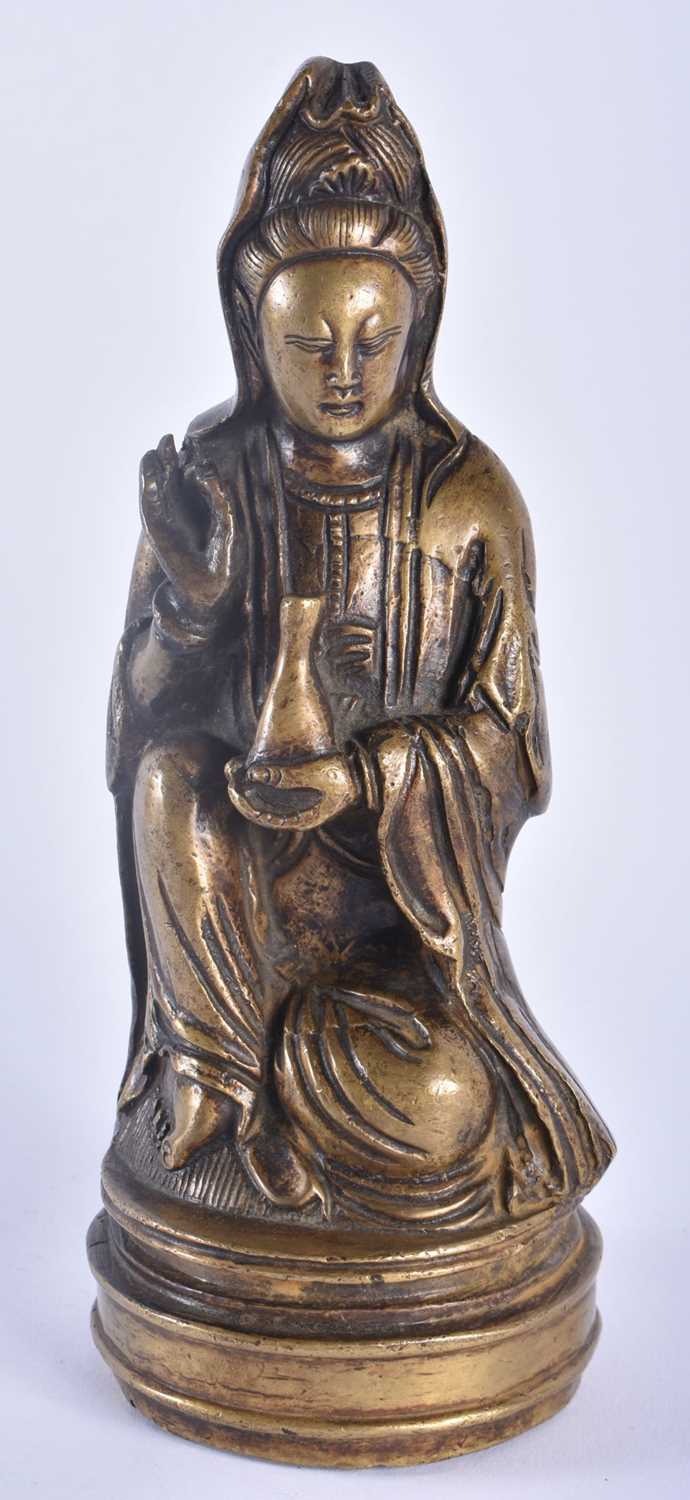 AN 18TH/19TH CENTURY CHINESE BRONZE FIGURE OF A SEATED IMMORTAL Qianlong/Jiaqing, modelled holding a