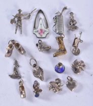 ASSORTED SILVER CHARMS. 26.8 grams. (qty)