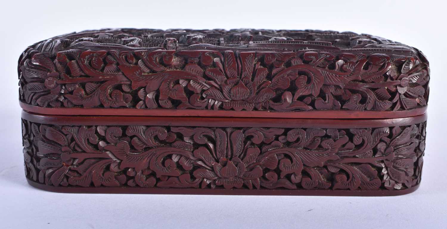 A CHINESE QING DYNASTY CARVED CINNABAR LACQUER BOX AND COVER decorated with figures in a