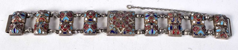 A Continental Silver and Enamel Panel Bracelet.Stamped 84. 19.5 cm x 2.4cm, weight 59.4g