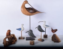 A collection of carved wooden birds largest 44 cm (7).