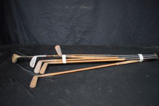 A collection of Hickory shafted golf clubs etc 112 cm (6).