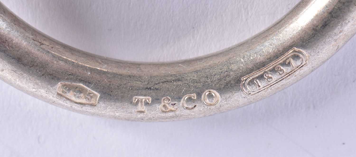 A TIFFANY & CO SILVER BANGLE. 32.1 grams. 9 cm x 5.5 cm. - Image 3 of 3