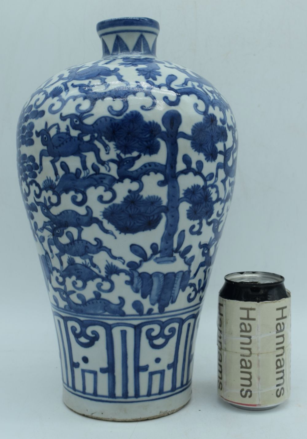 A Chinese porcelain blue and white Meiping vase decorated with animals 35 cm.