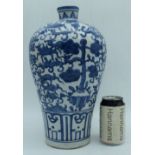 A Chinese porcelain blue and white Meiping vase decorated with animals 35 cm.