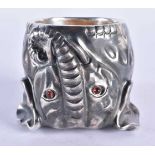 A CONTINENTAL SILVER GEM SET ELEPHANT BEAKER. 280 grams. 9 cm x 9 cm.