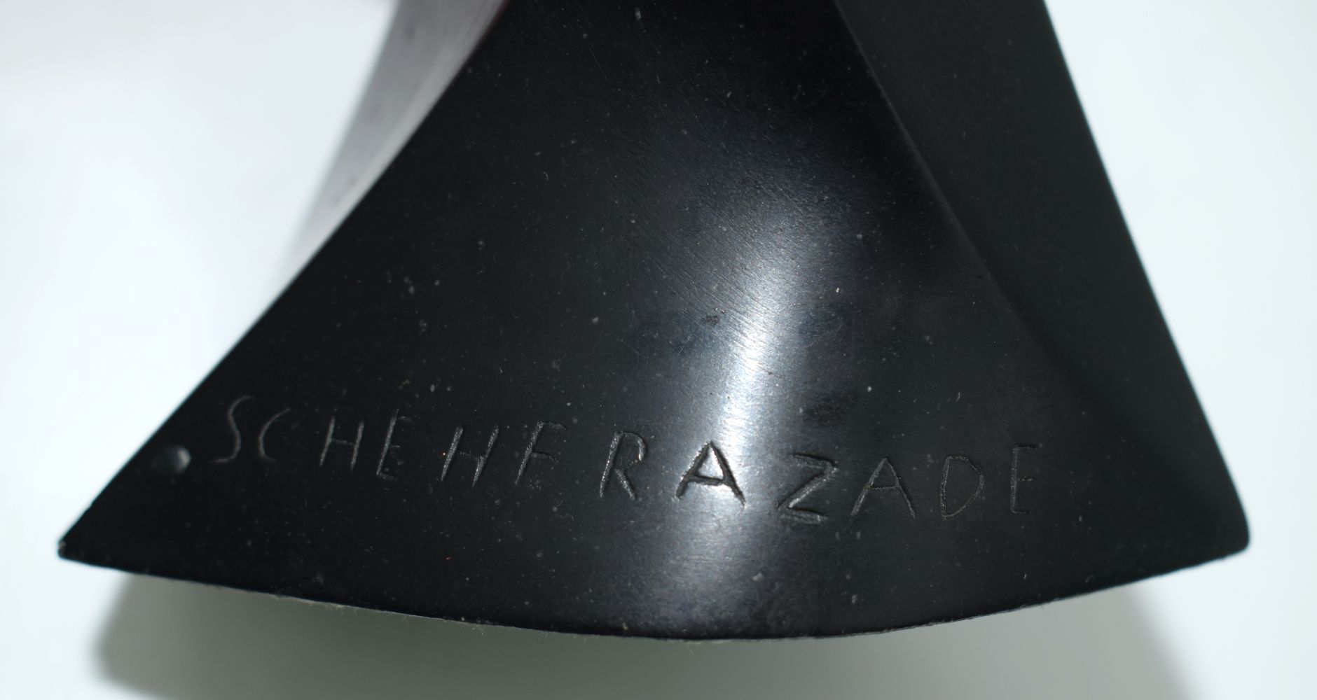 A polished stone bust of Scheherazade signed E Villanis 26cm. - Image 9 of 10