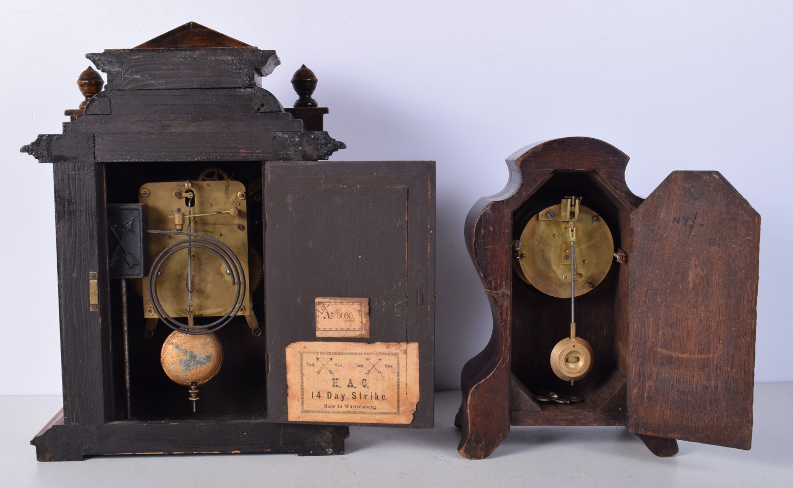 An antique wooden inlaid mantle clock with a porcelain face together with a carved Oak mantle clock - Image 9 of 10