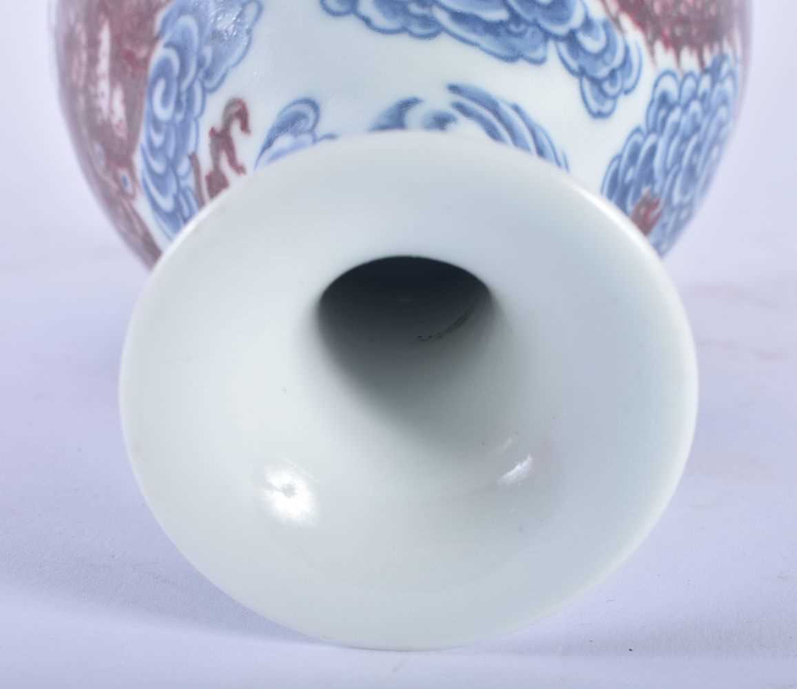 A CHINESE IRON RED BLUE AND WHITE PORCELAIN DRAGON VASE 20th Century, together with a bowl & brush - Image 3 of 6