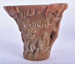 A CHINESE CARVED BUFFALO HORN TYPE LIBATION CUP 20th Century. 575 grams. 13 cm x 13 cm.