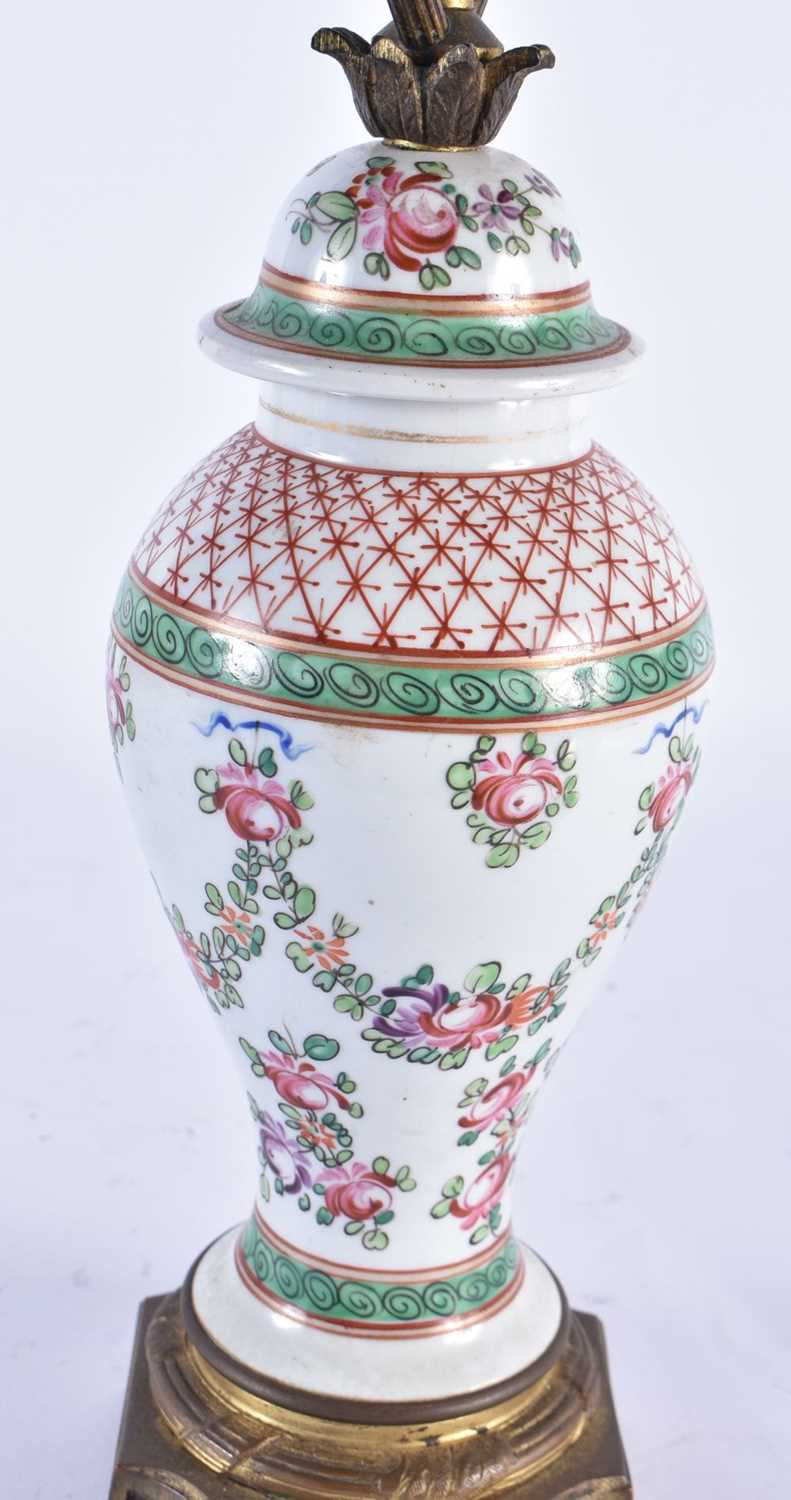 A 19TH CENTURY FRENCH SAMSONS OF PARIS PORCELAIN LAMP painted with flowers. 45cm high. - Image 3 of 5
