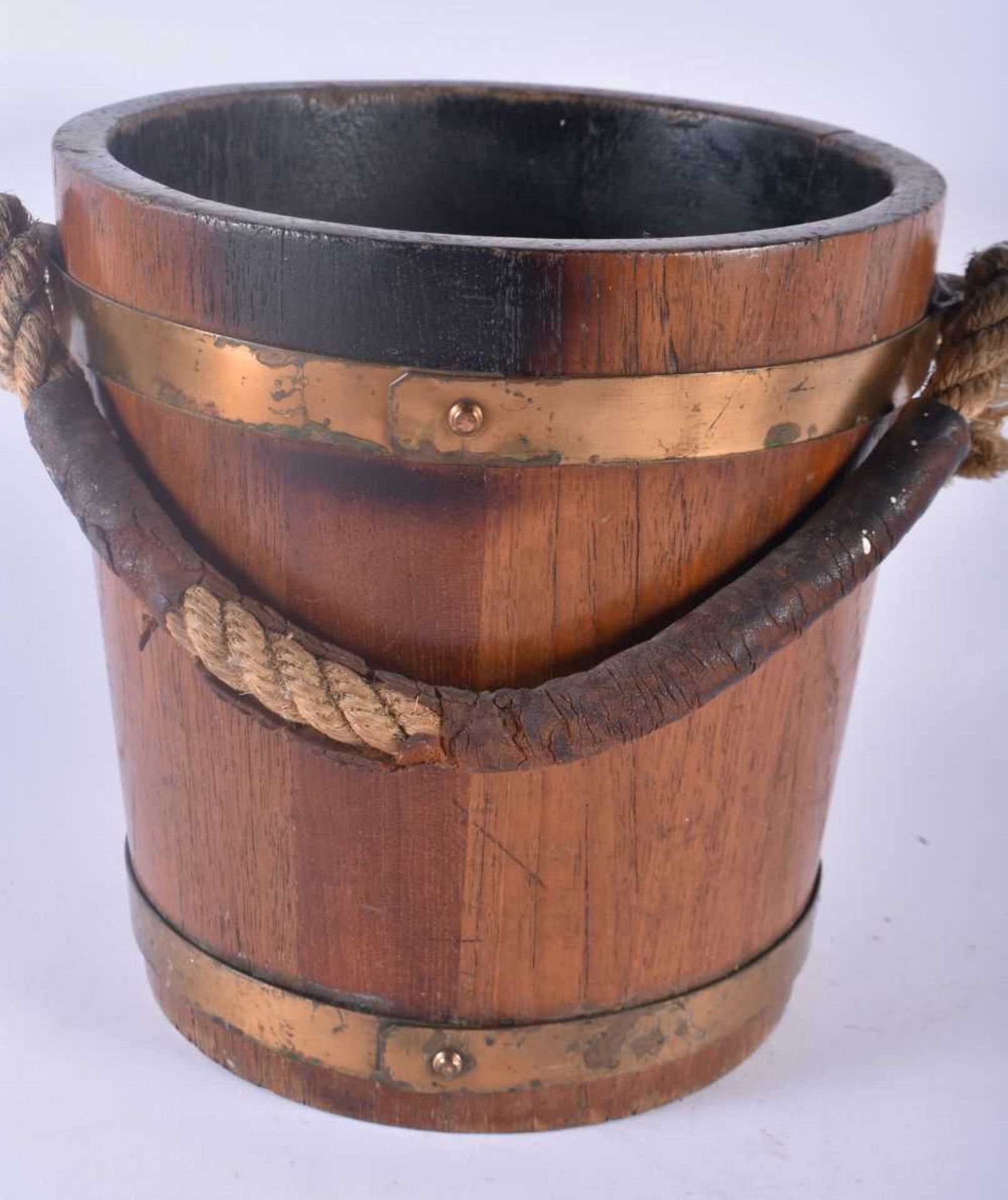 AN EDWARDIAN COUNTRY HOUSE OAK AND BRASS BOUND NAVAL FIRE BUCKET painted with a coat of arms. 34 - Image 3 of 5