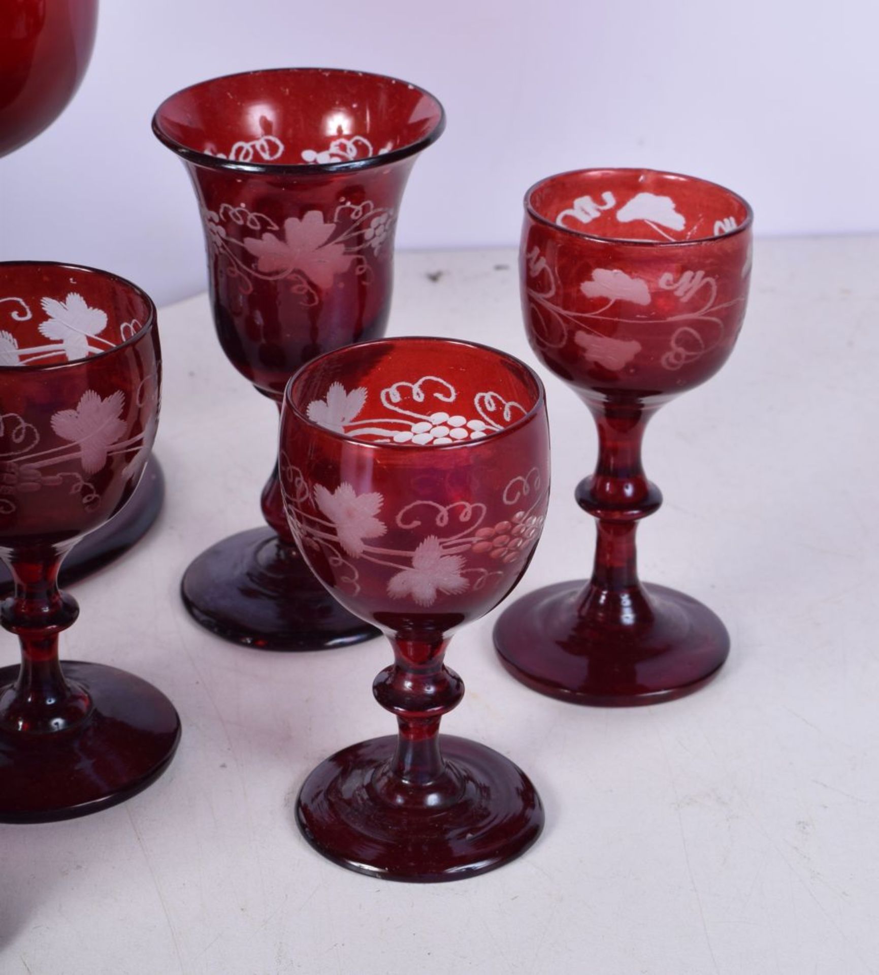 A collection of 1950's Bohemian Ruby wine glasses engraved with a Floral pattern together with a - Image 8 of 8