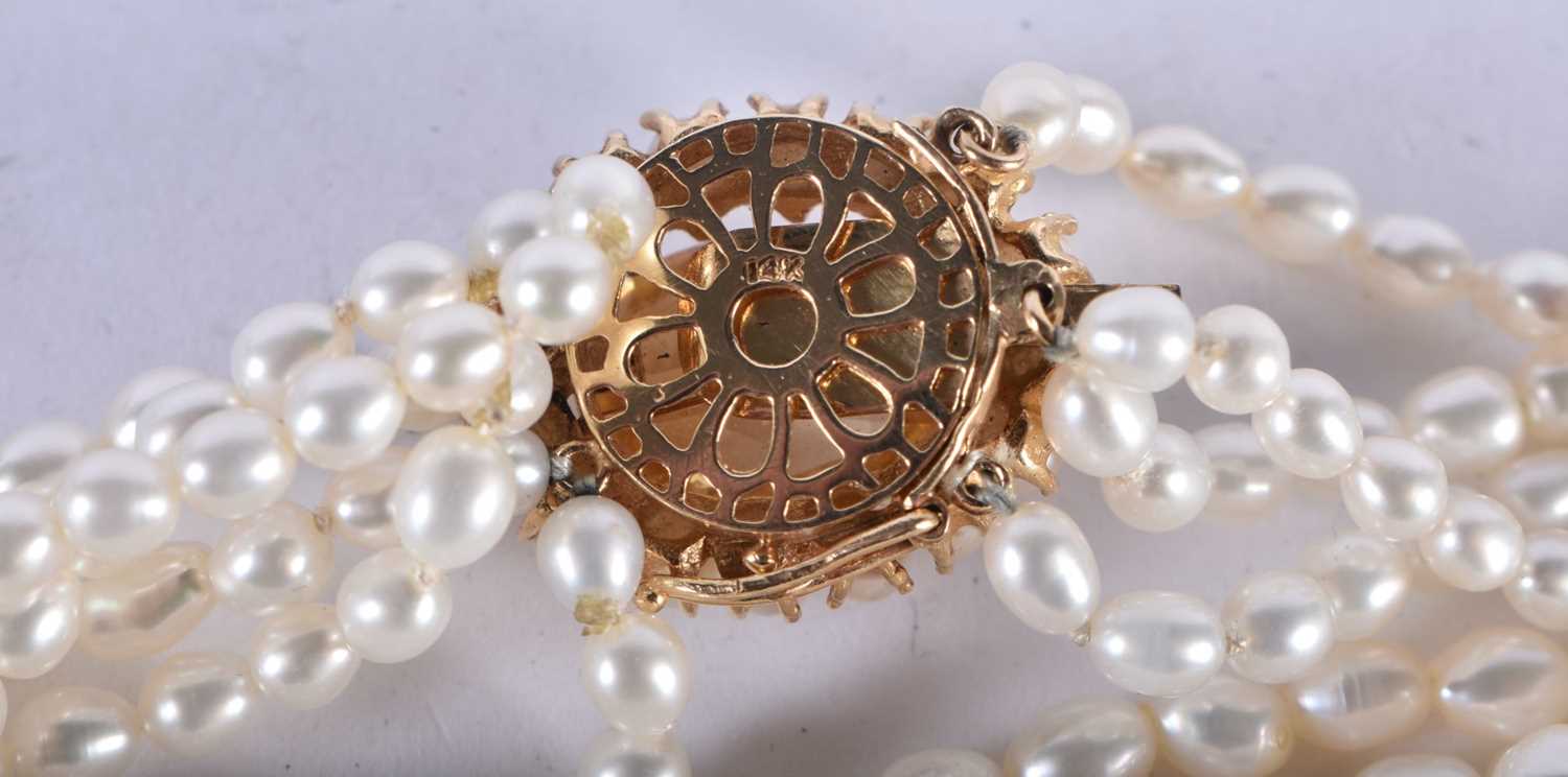 A Six Strand Pearl Necklace with a 14 Carat Gold and Citrine Clasp. 43cm long, weight 58.21g - Image 4 of 4