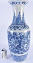 A LARGE 19TH CENTURY CHINESE BLUE AND WHITE PORCELAIN VASE Qing, painted with bold floral sprays. 58