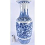 A LARGE 19TH CENTURY CHINESE BLUE AND WHITE PORCELAIN VASE Qing, painted with bold floral sprays. 58