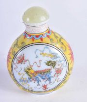 A CHINESE ENAMELLED PEKING GLASS SNUFF BOTTLE AND STOPPER 20th Century. 109 grams. 7.5 cm x 5.5 cm.
