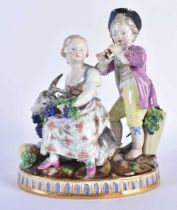 Late 19th century Meissen figural group of two children and a goat, he playing a flute and she