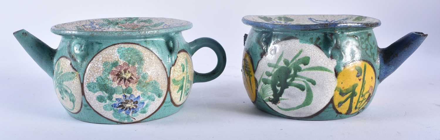 A PAIR OF 19TH CENTURY CHINESE ENAMELLED YIXING POTTERY TEAPOTS painted with flowers. 15 cm wide. - Image 3 of 5