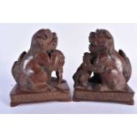 A PAIR OF 19TH CENTURY CHINESE BRONZE DOG OF FOE BOOK ENDS Qing. Each 18cm x 13 cm.