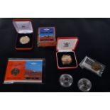 Two Silver 1 ounce coins together with Royal mint commemorative Australian 5 & 10 Dollar coins (6).