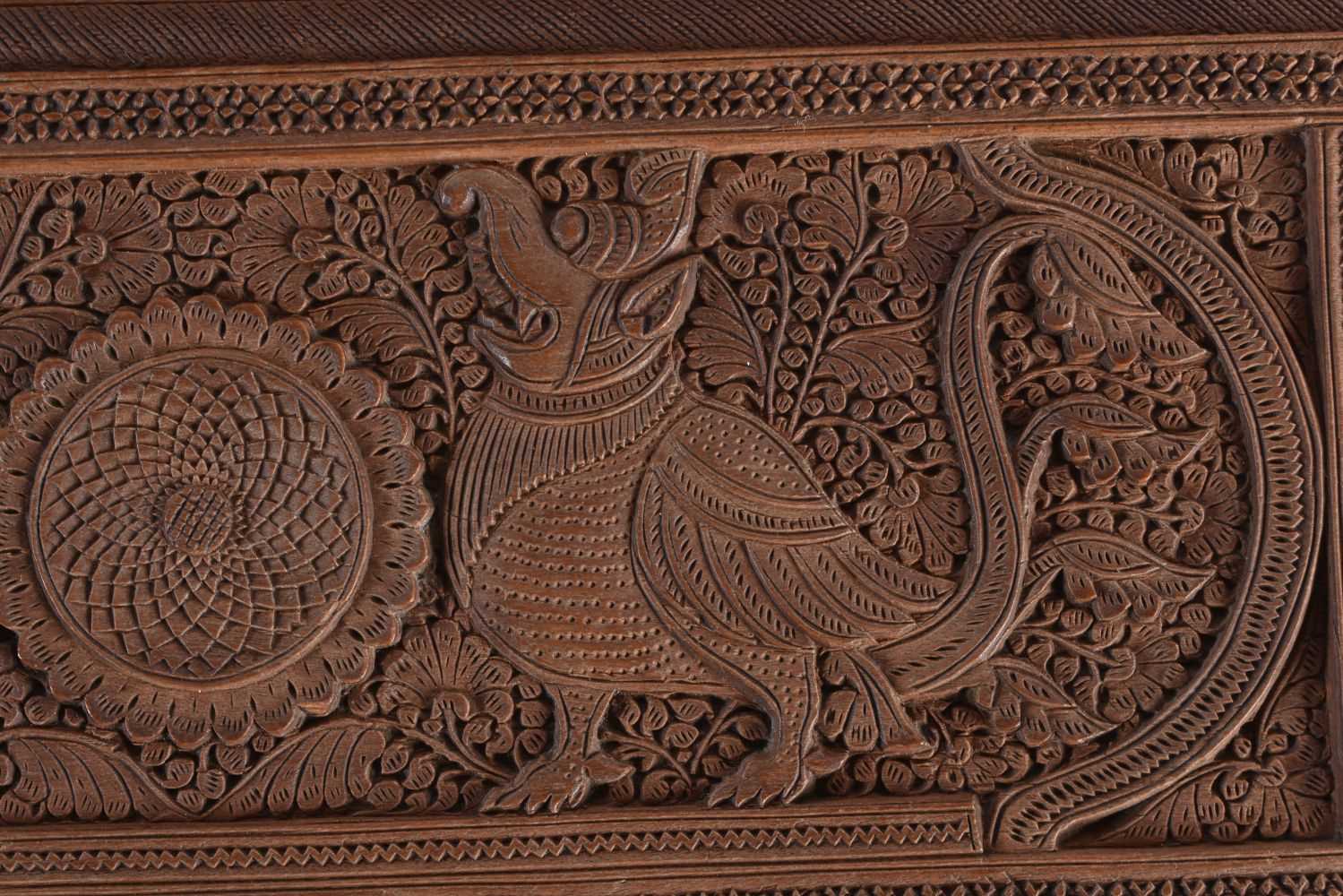 A FINE MID 19TH CENTURY ANGLO INDIAN CARVED WOOD CASKET AND COVER decorated with mythical birds, - Image 9 of 12