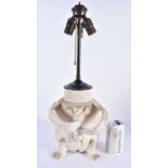 A VERY UNUSUAL 18TH CENTURY SALT GLAZED BEAR BAITING LAMP formed as the body of a bear holding a