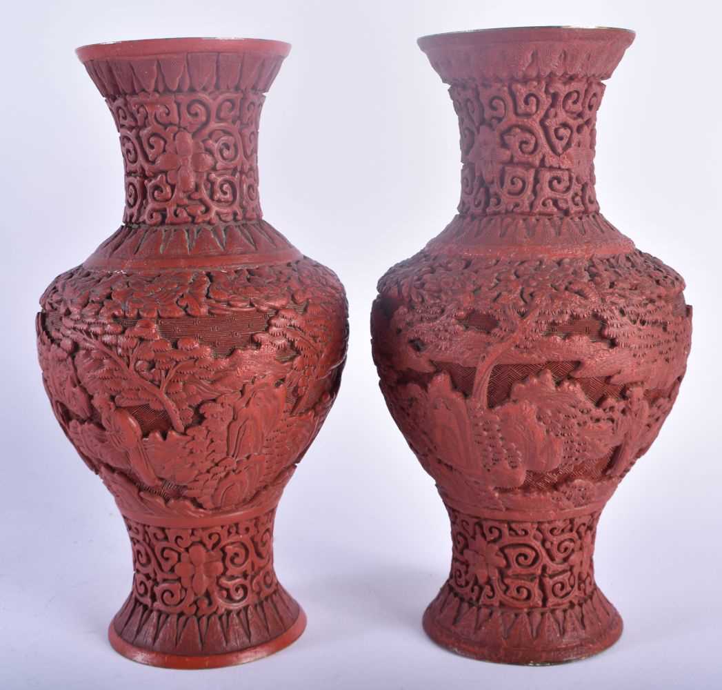 A PAIR OF 19TH CENTURY CHINESE CARVED CINNABAR LACQUER VASES Qing, decorated with figures in - Image 2 of 5