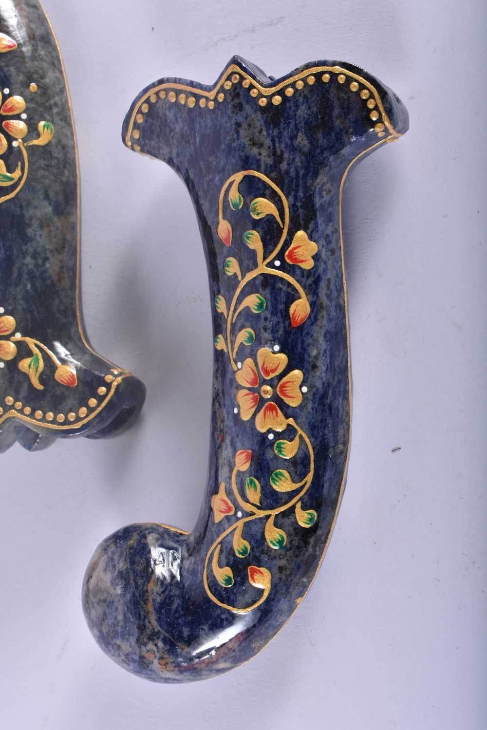 A SET OF FIVE MIDDLE EASTERN QAJAR LACQUER HARDSTONE DAGGER HANDLES overlaid with foliage and vines. - Image 2 of 4