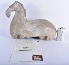 A LARGE CHINESE HAN DYNASTY GREY POTTERY FIGURE OF A HORSE C202 BC - 220 AD. 42 cm x 34 cm.