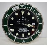 A Contemporary Rolex style dealership clock 33 cm.