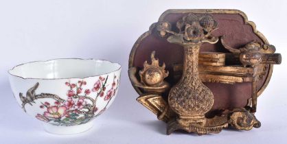 A 19TH CENTURY CHINESE CARVED WOOD TEMPLE CARVING together with a famille rose bowl. 12 cm x 9