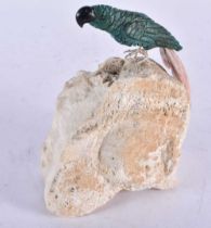 A Carved Hardstone Model of a Parrot with Silver Feet Perched on a Rock. 14cm x 12cm x 6.5 cm