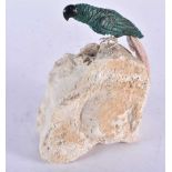 A Carved Hardstone Model of a Parrot with Silver Feet Perched on a Rock. 14cm x 12cm x 6.5 cm