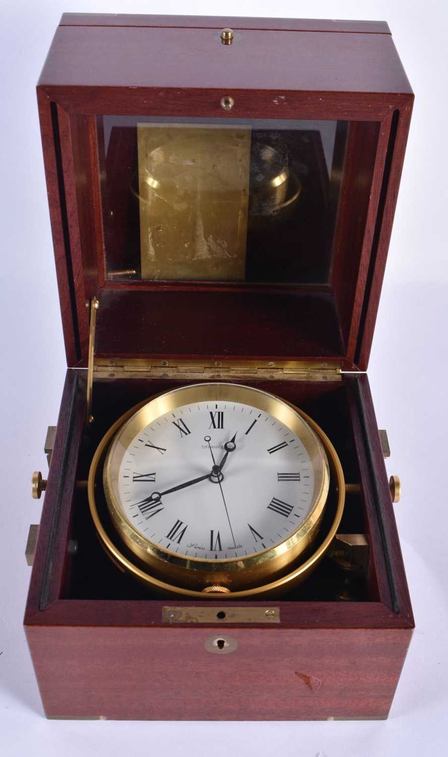 A TIFFANY & CO MARINE CHRONOMETER STYLE MAHOGANY DESK CLOCK. 18cm x 18cm.