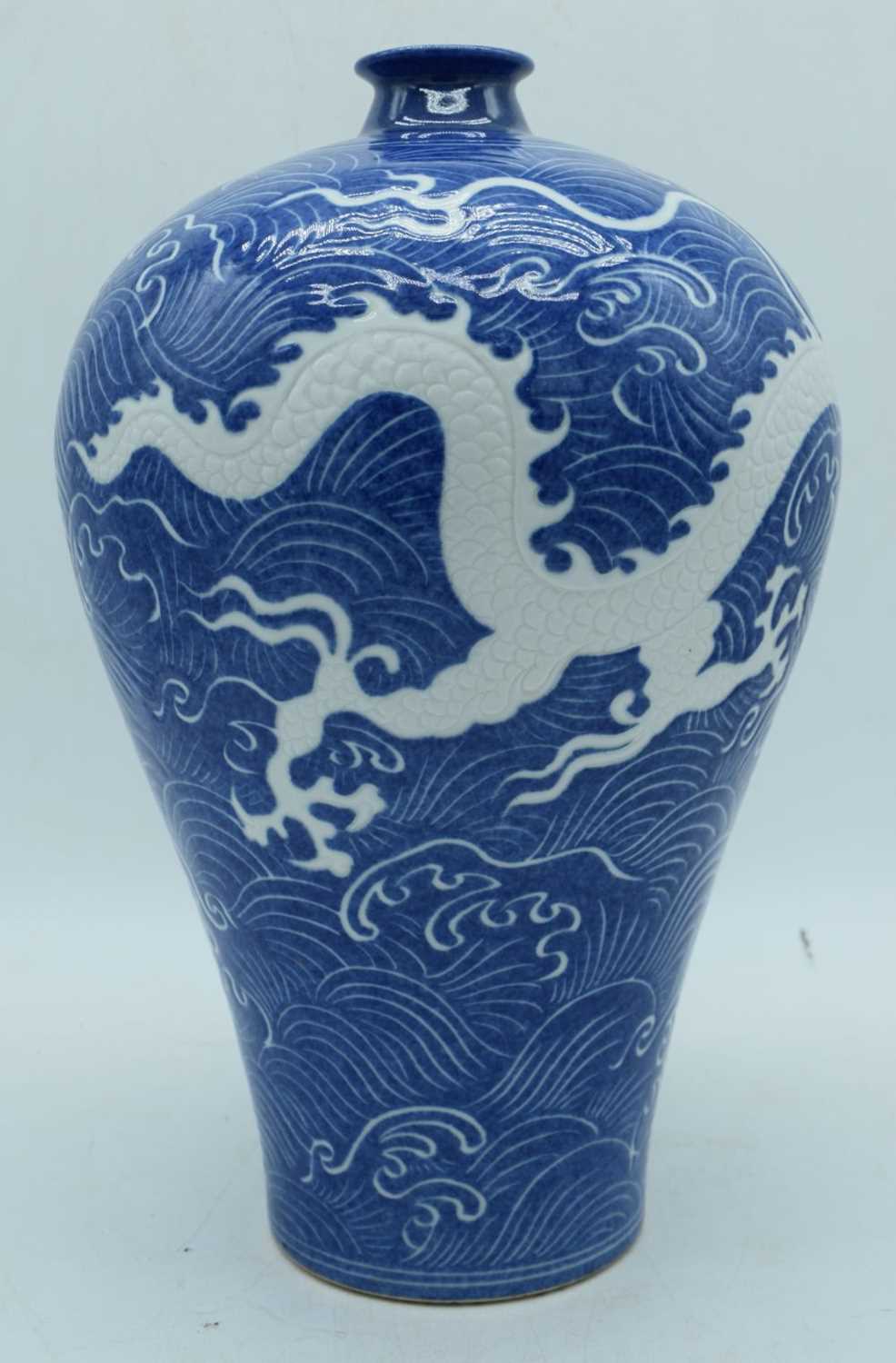 A Chinese porcelain Meiping vase decorated with a Dragon and cloud pattern in relief 37 cm. - Image 3 of 8
