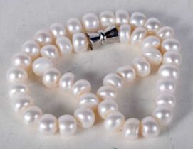 A Pearl Necklace. 46cm long, largest Pearl 11.6mm, weight 94g